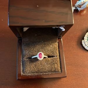Diamond, pink sapphire, and white gold ring